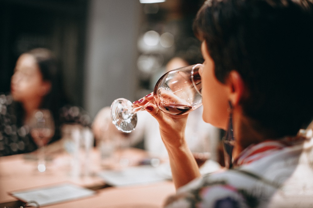 wine taster silhouette at table